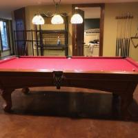 Pool Table With Stools and Light